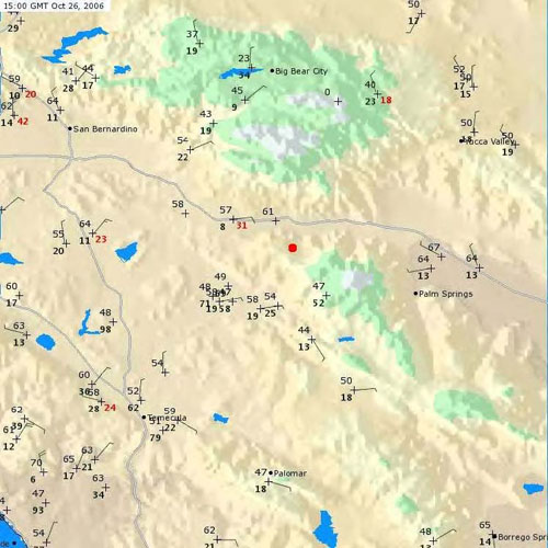Fire Weather Figure 1 - 15Z October 26 (7:00 am PDT) Surface data over southern California showing Temperature, Relative Humidity, wind direction and speed, and wind gusts in red. The accident site is near the red dot in the middle of the map. The Beaumont RAWS is located northwest of the accident site showing a temperature of 57, Relative Humidity of 8 percent and a wind gust of 31 mph out of the east. 
